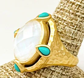 Large cocktail ring with large center oval faux mother of pearl and side faux turquoise pear shadows stone accents